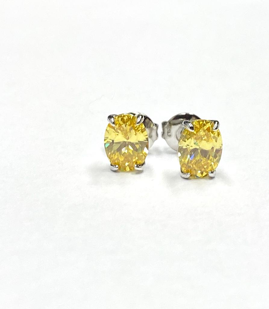 Clear Oval Yellow Studs